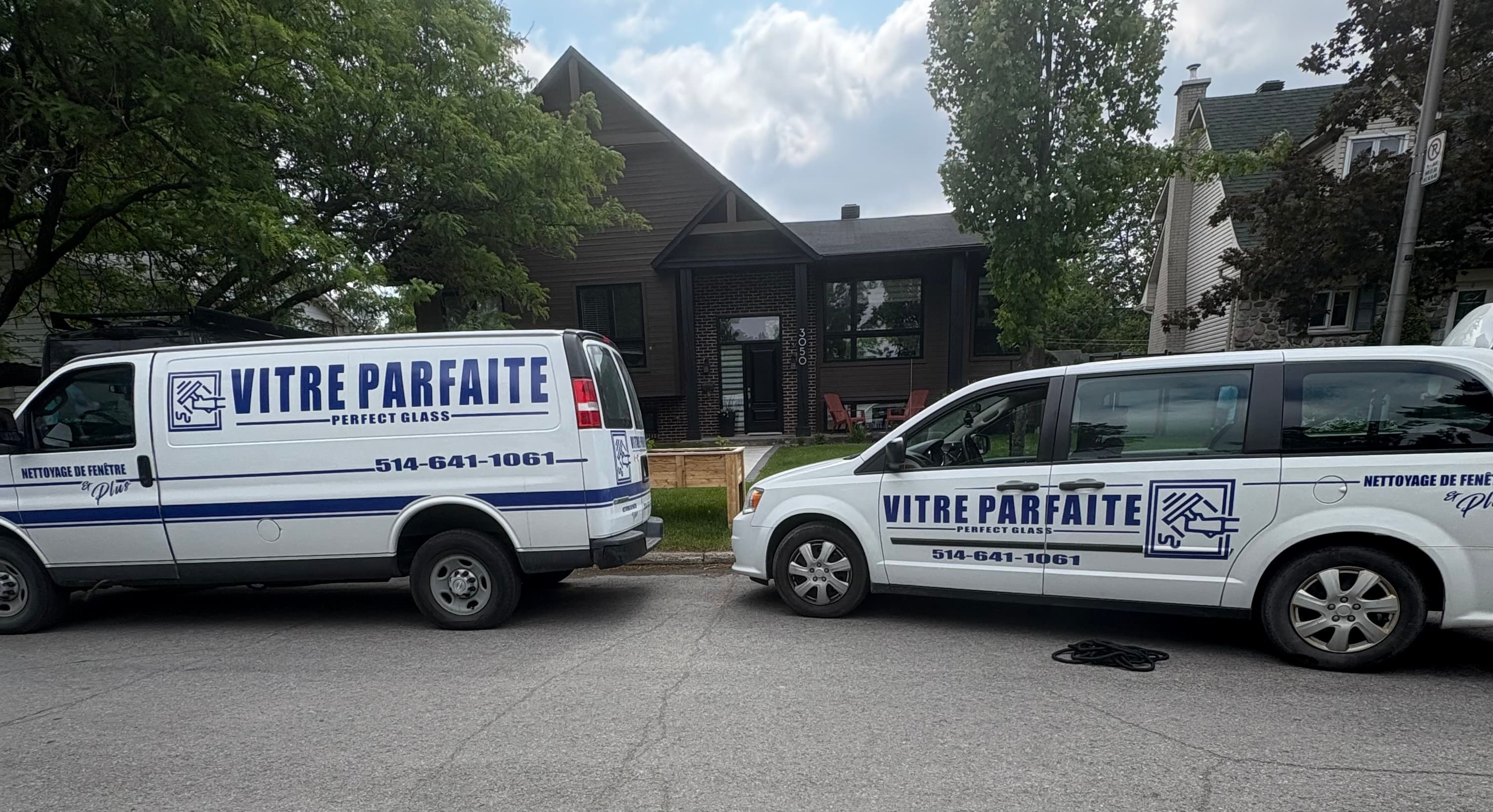 Perfect Glass trucks parked in front of a home in Laval